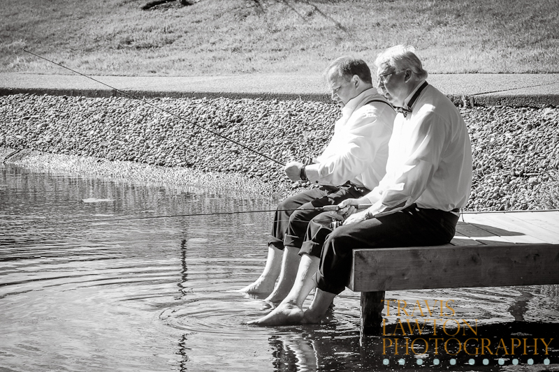 Bride and Groom's Father's sharing a Huck Finn moment